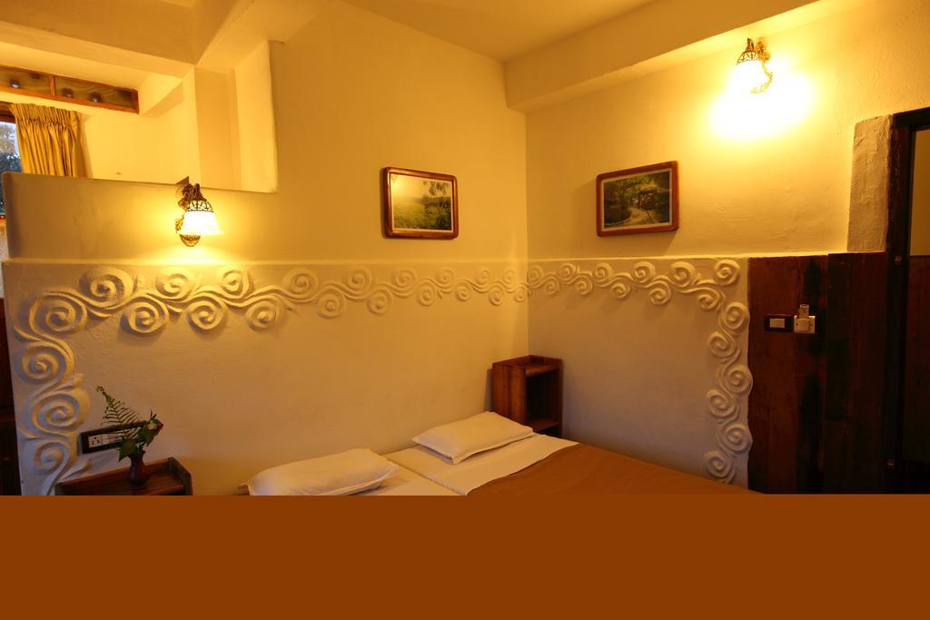 Coffee Inn Kumily Rum bild