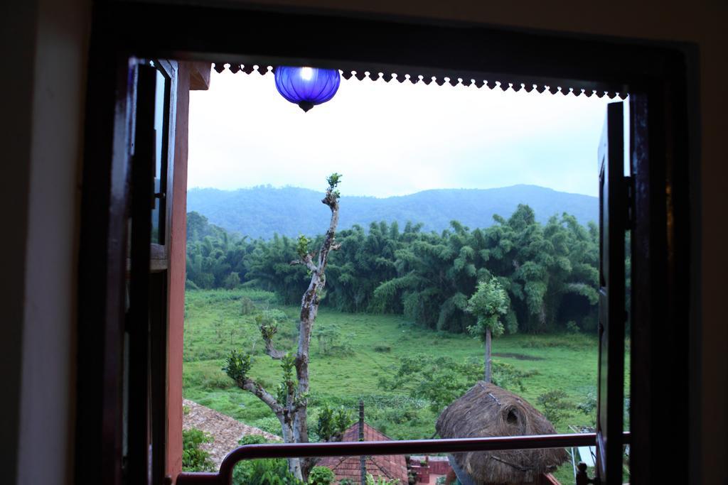 Coffee Inn Kumily Rum bild